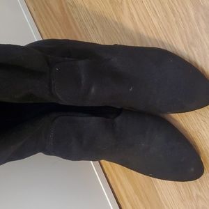 Knee length suede boots